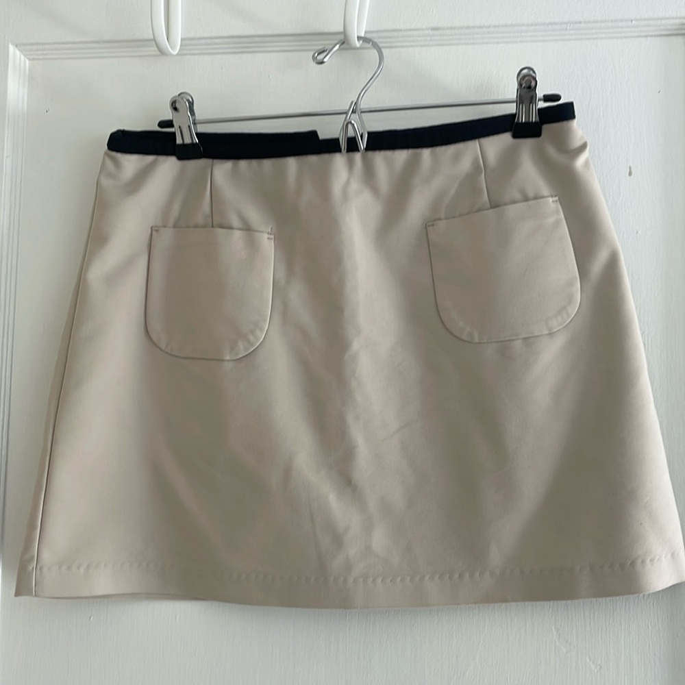 Tan mini skirt with pockets